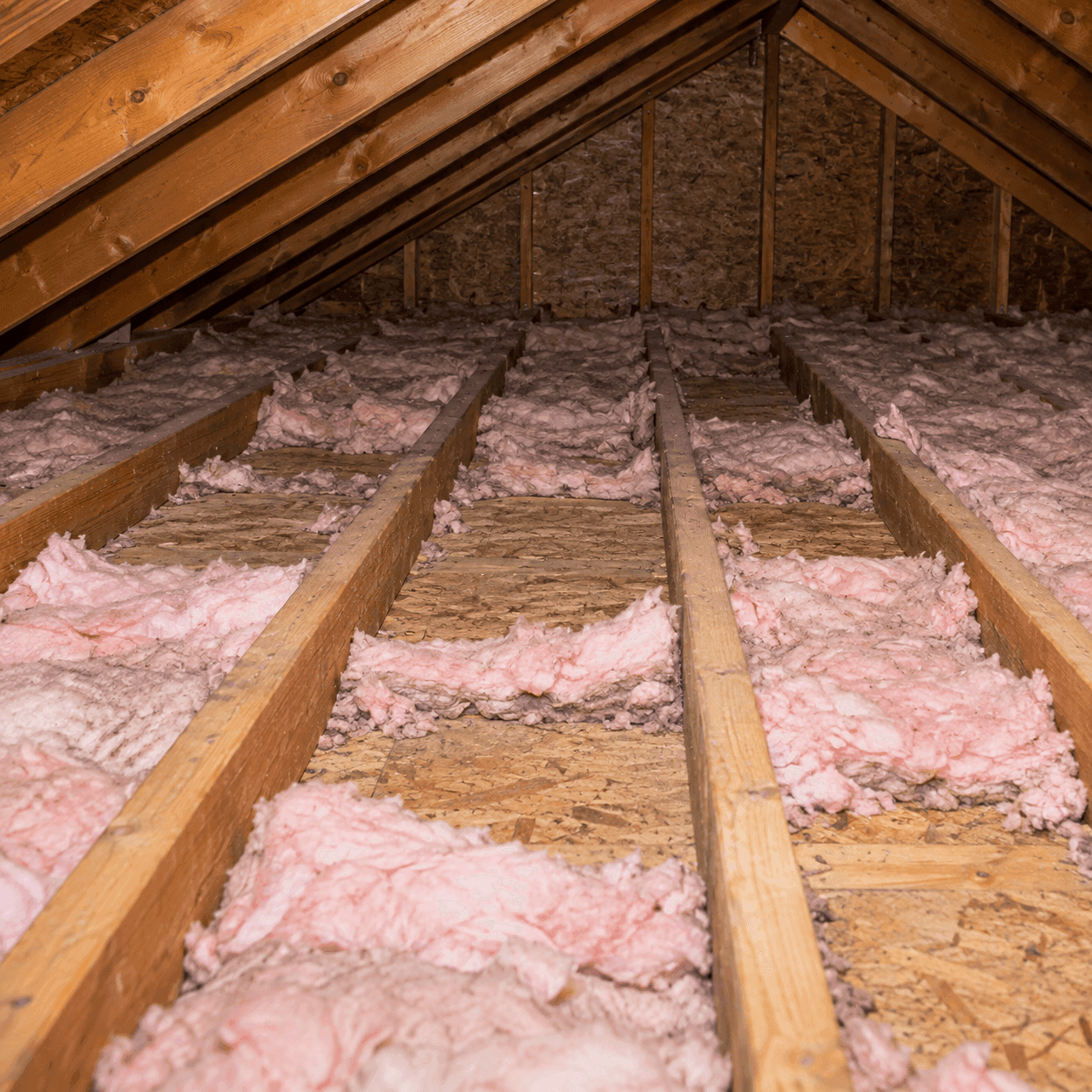 Thin, patchy attic insulation below the level of the joists