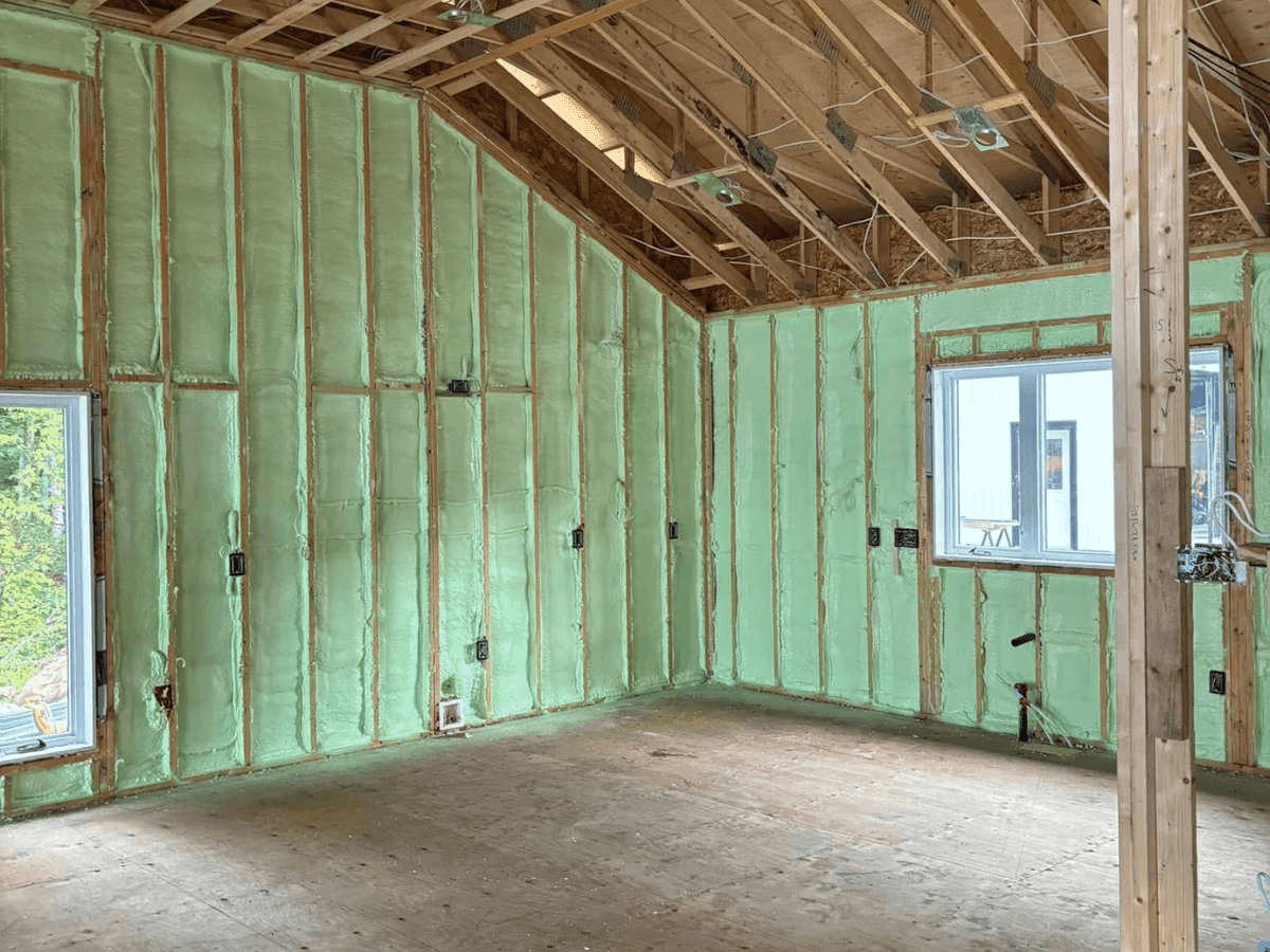 Closed-cell spray foam insulation applied between wall studs