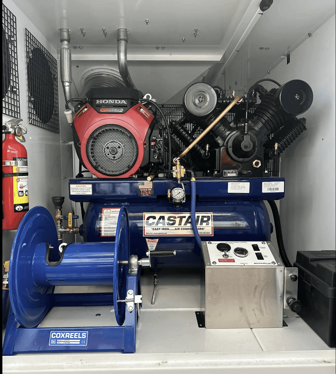 Truck-mounted duct cleaning equipment in action
