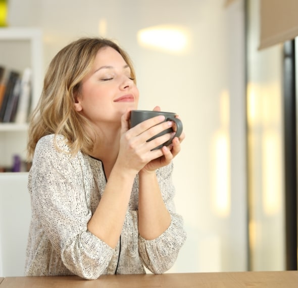 woman breathing fresh air