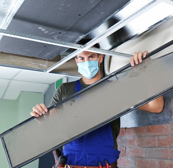 duct cleaning worker