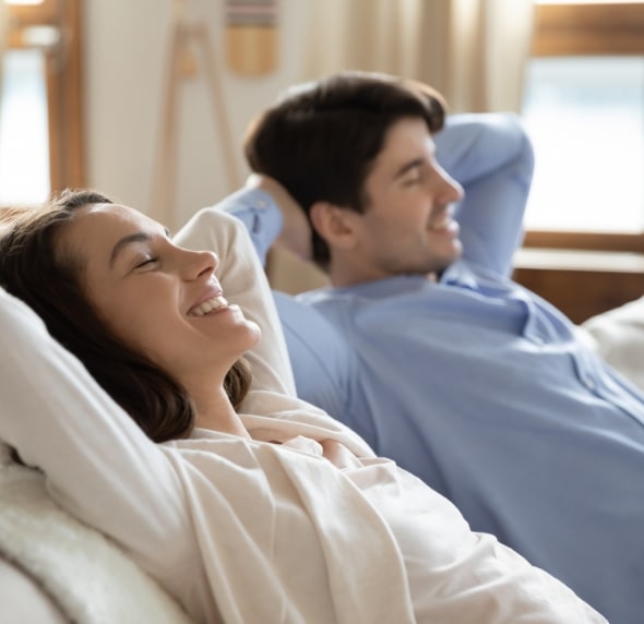 young couple relaxing in home
